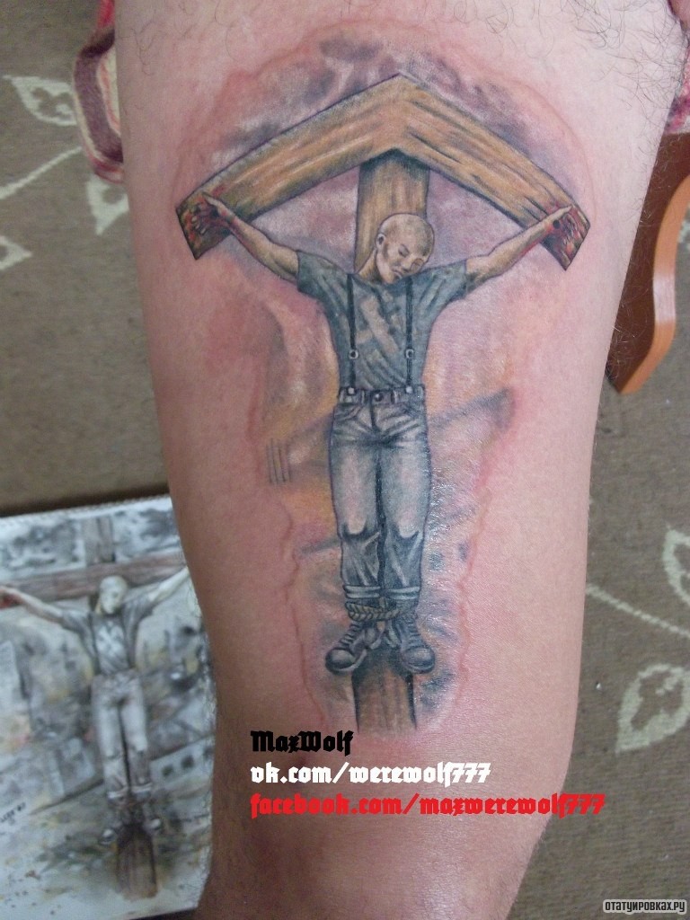 Фотография татуировки под названием «Распятый человек»
