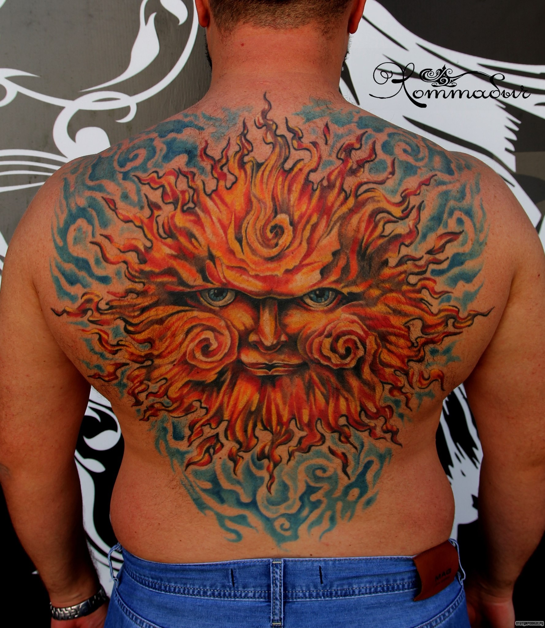 Фотография татуировки под названием «Огонь и вода»