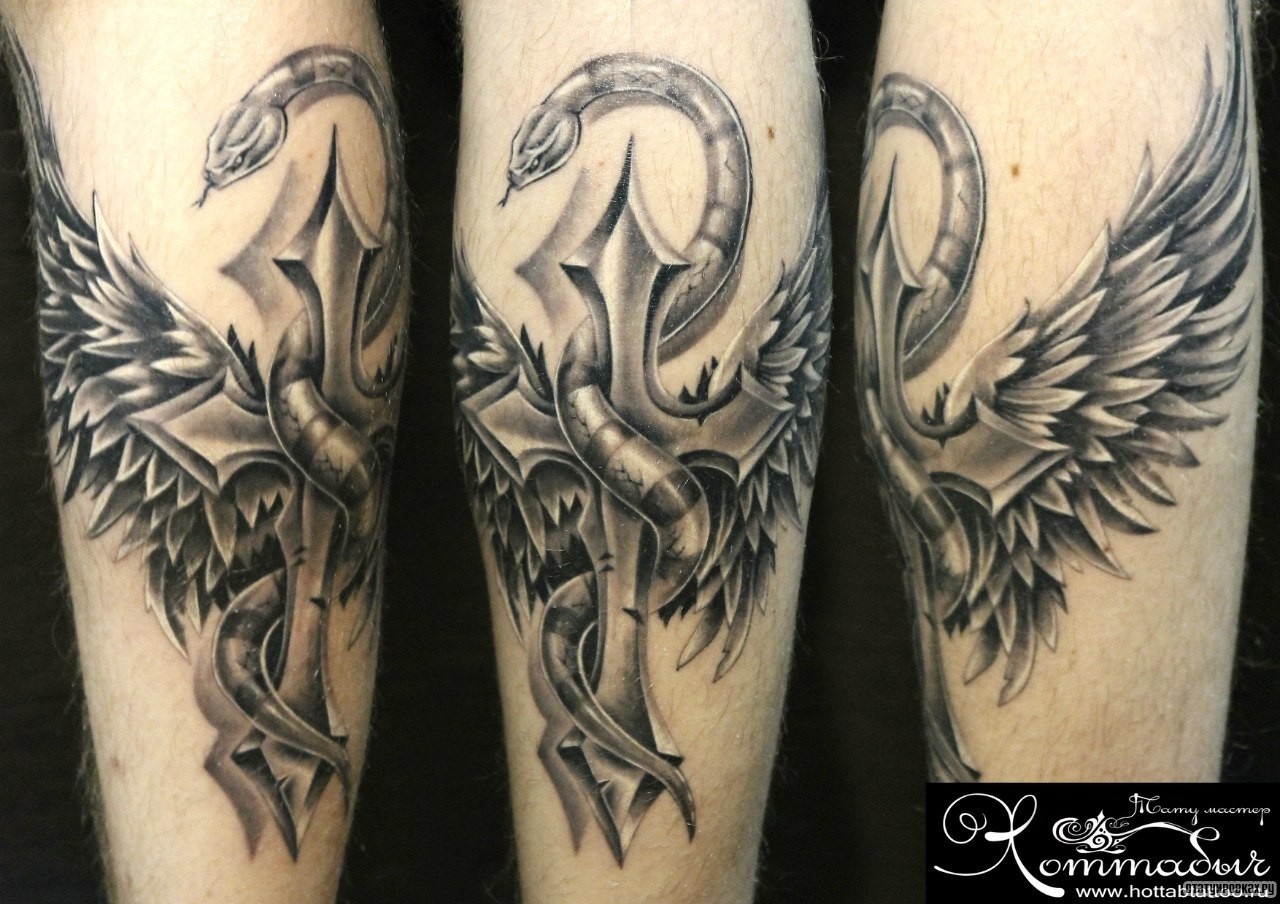 Фотография татуировки под названием «Змея обвивает крест»