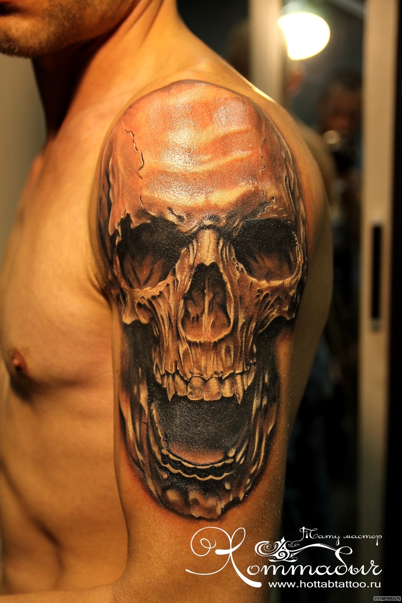 Фотография татуировки под названием «Человеческий череп с оскалом»