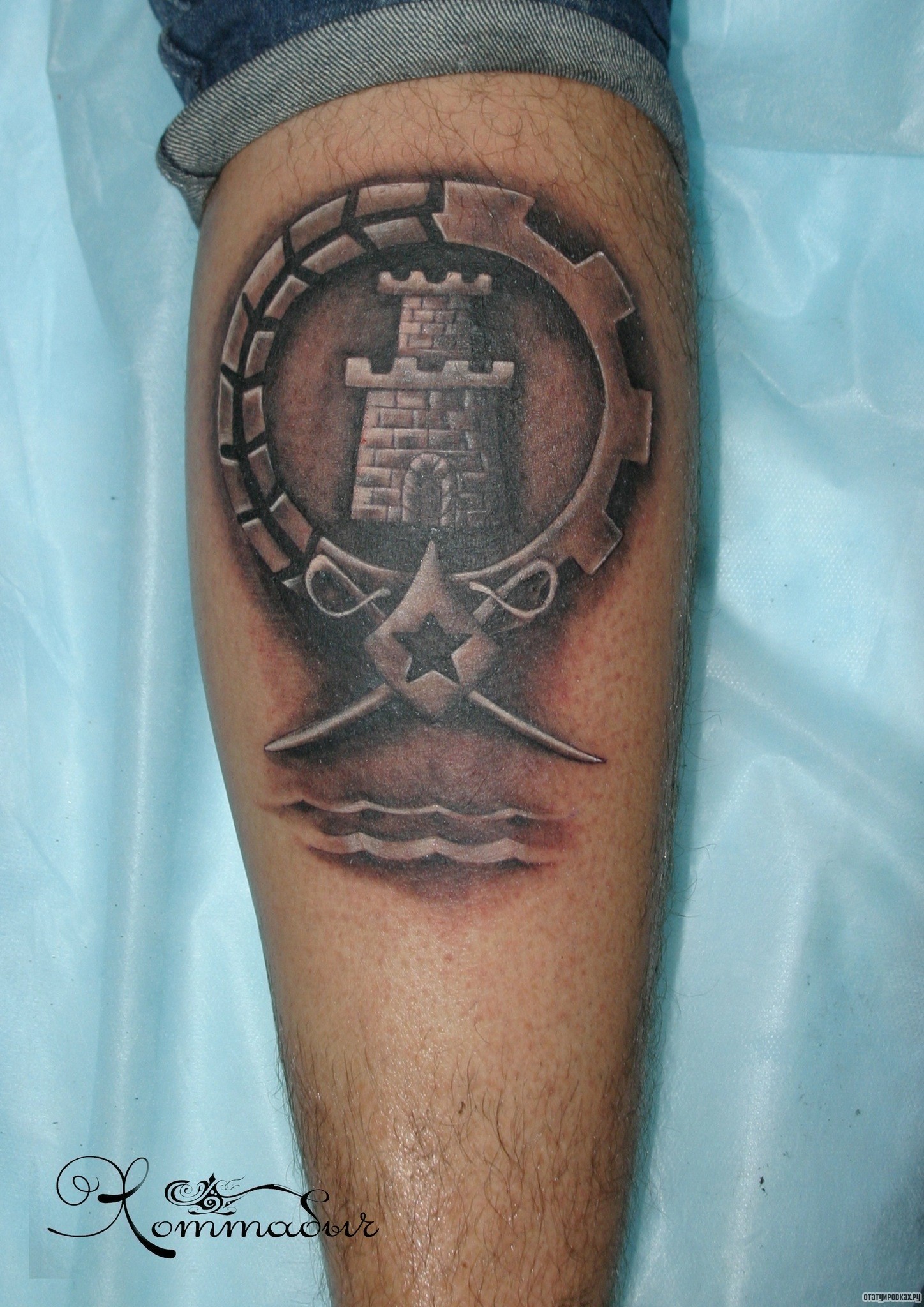 Фотография татуировки под названием «Тату символ в виде башни»