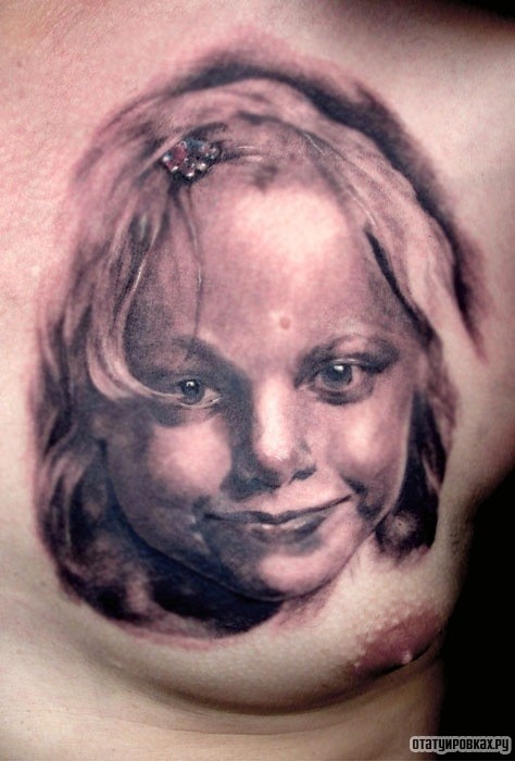 Фотография татуировки под названием «Портрет ребенка»