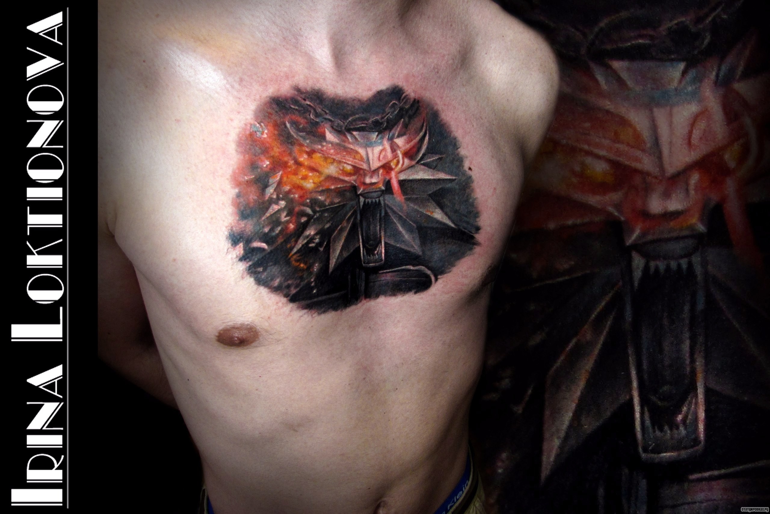 Фотография татуировки под названием «Непонятное существо на груди»