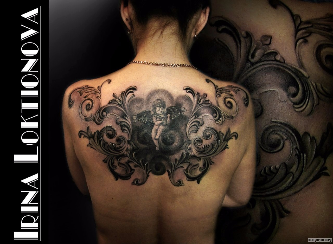 Фотография татуировки под названием «Вензеля и ангел»