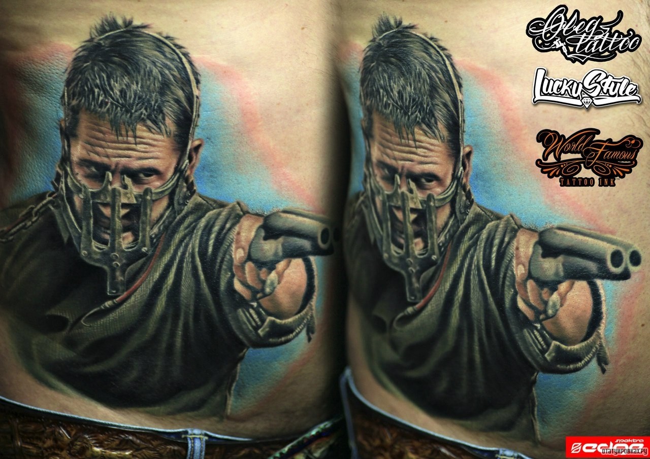 Фотография татуировки под названием «Человек с двустволкой»