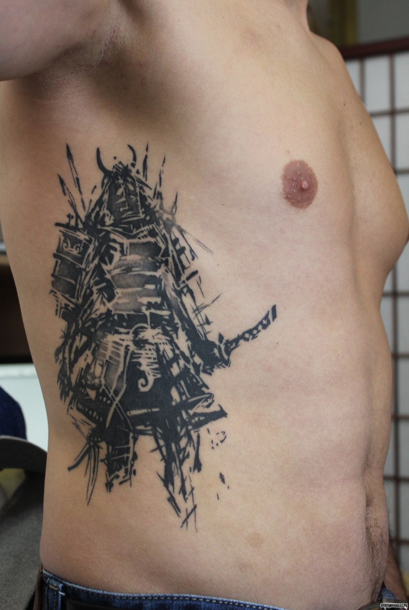 Фотография татуировки под названием «Воин в стиле треш полька»