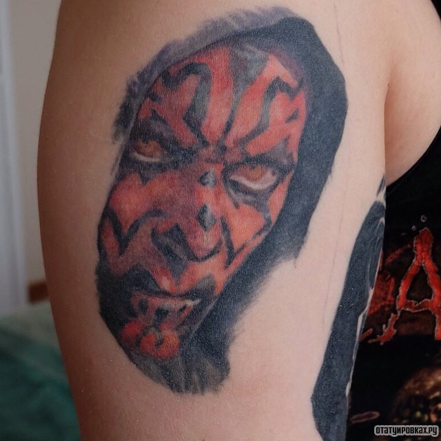 Фотография татуировки под названием «Красное лицо»