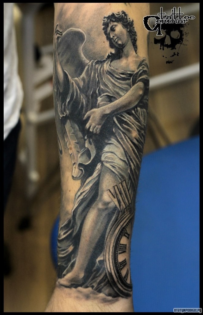 Фотография татуировки под названием «Ангел скульптура»