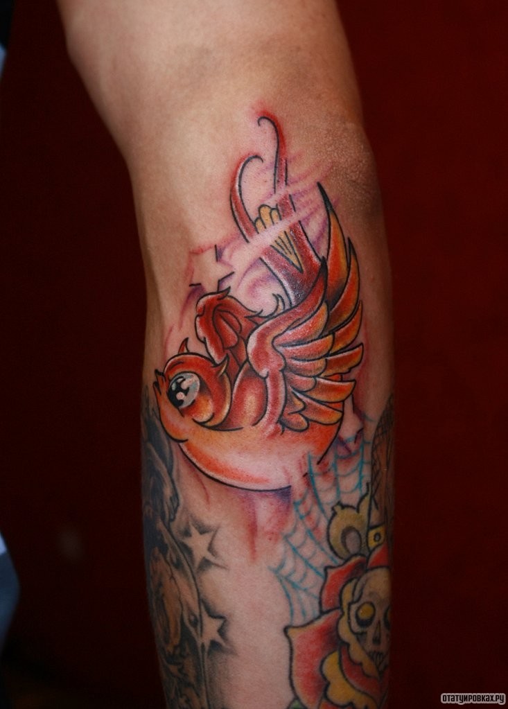 Фотография татуировки под названием «Ласточка дьявол»