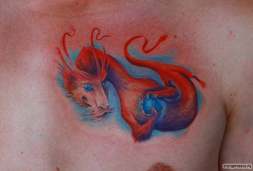 Фотография татуировки под названием «Рыжий дракон»