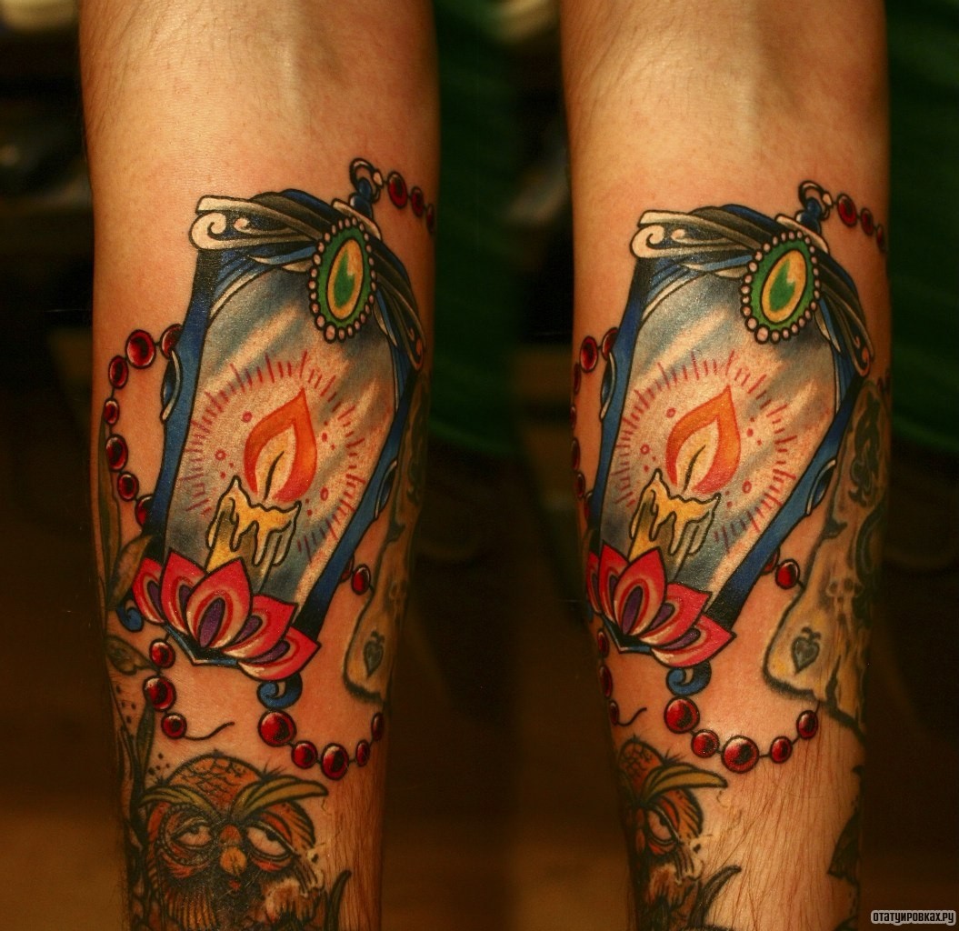 Фотография татуировки под названием «Лампа со свечой»
