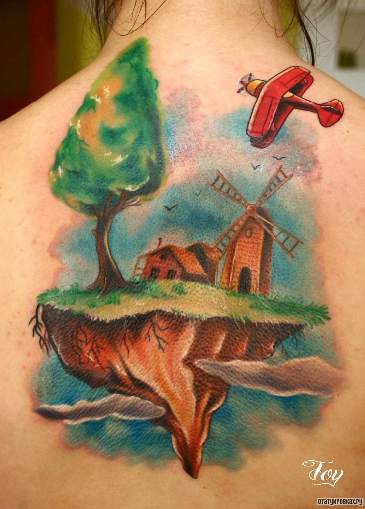 Фотография татуировки под названием «Мельница и дерево с кукурузником»