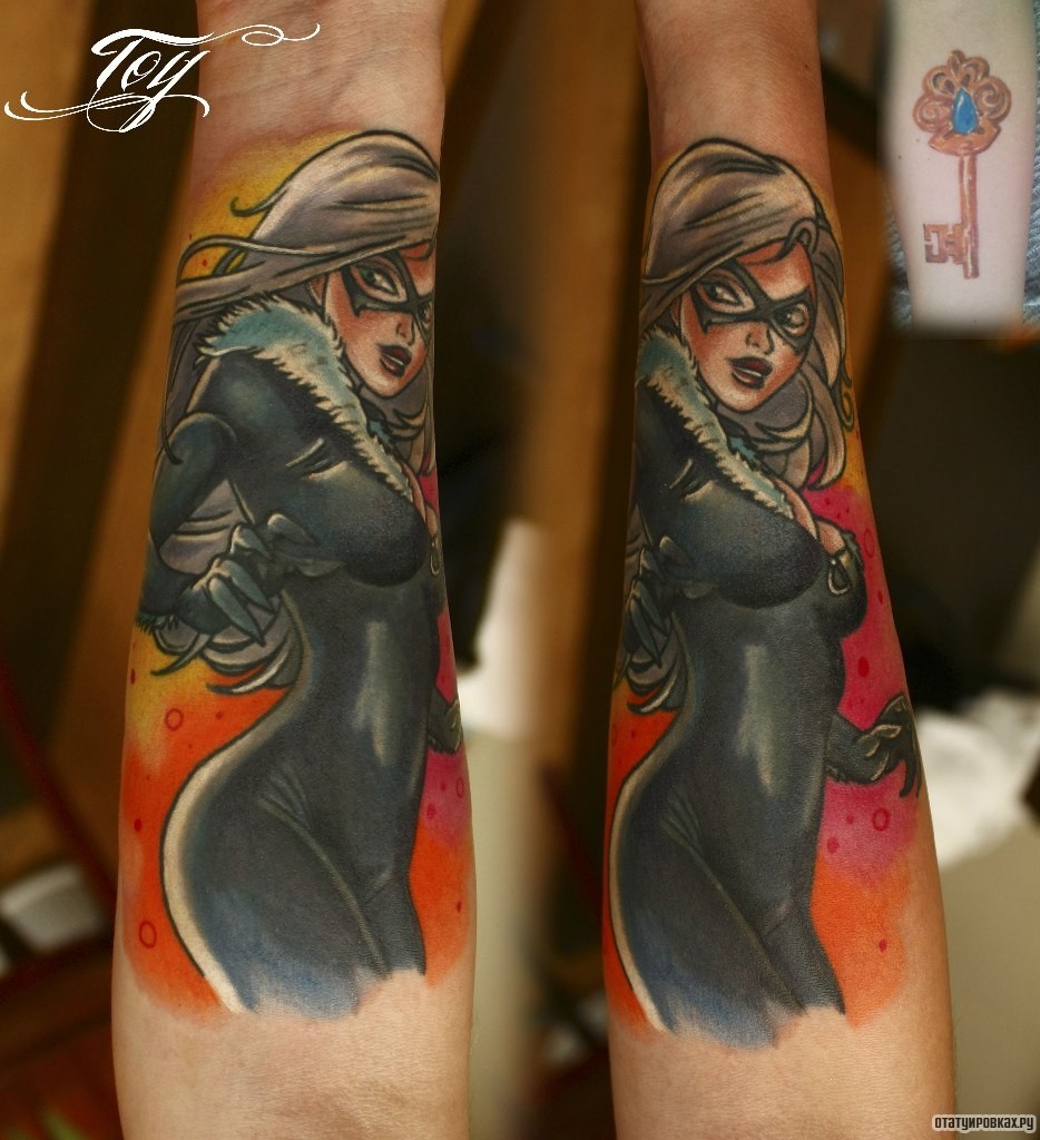 Фотография татуировки под названием «Черная девушка в маске»