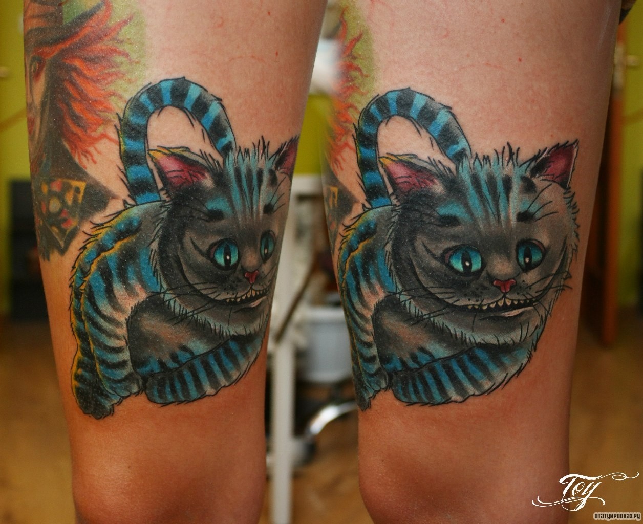 Фотография татуировки под названием «Чеширский полосатый кот»