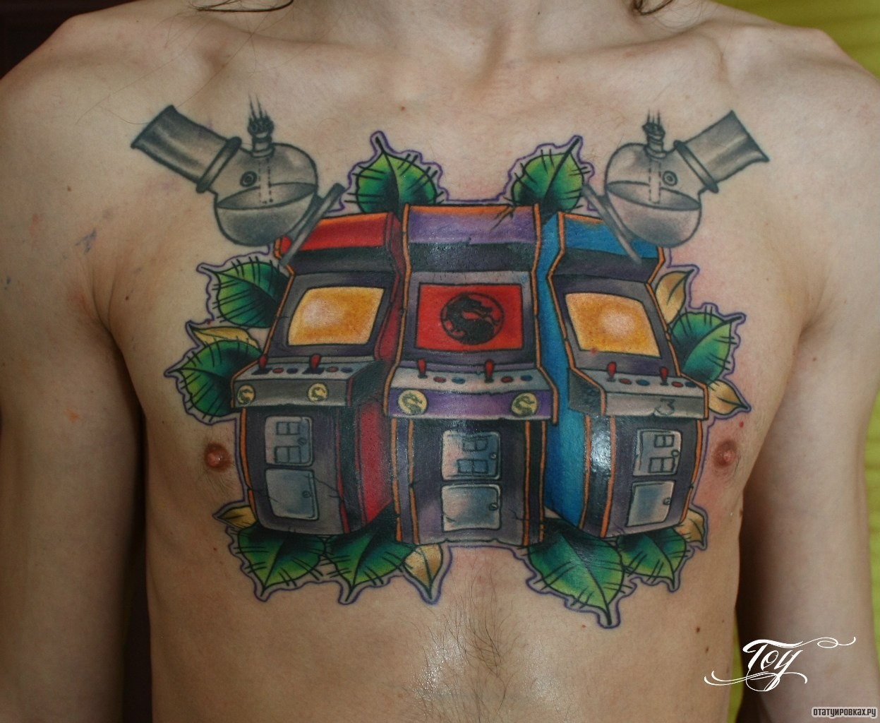 Фотография татуировки под названием «Игровые автоматы»