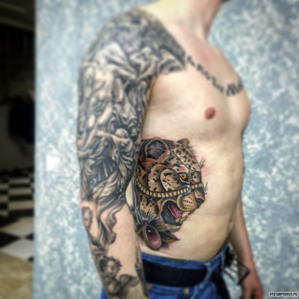 Фотография татуировки под названием «Тигрица с украшениями сбоку тела»
