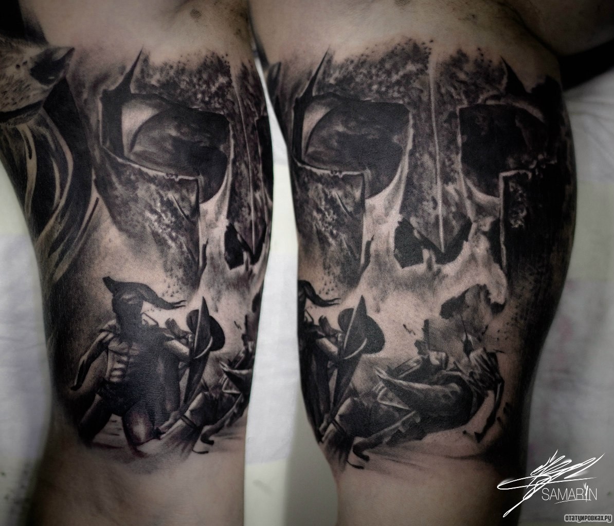 Фотография татуировки под названием «Сражение на бицепсе»