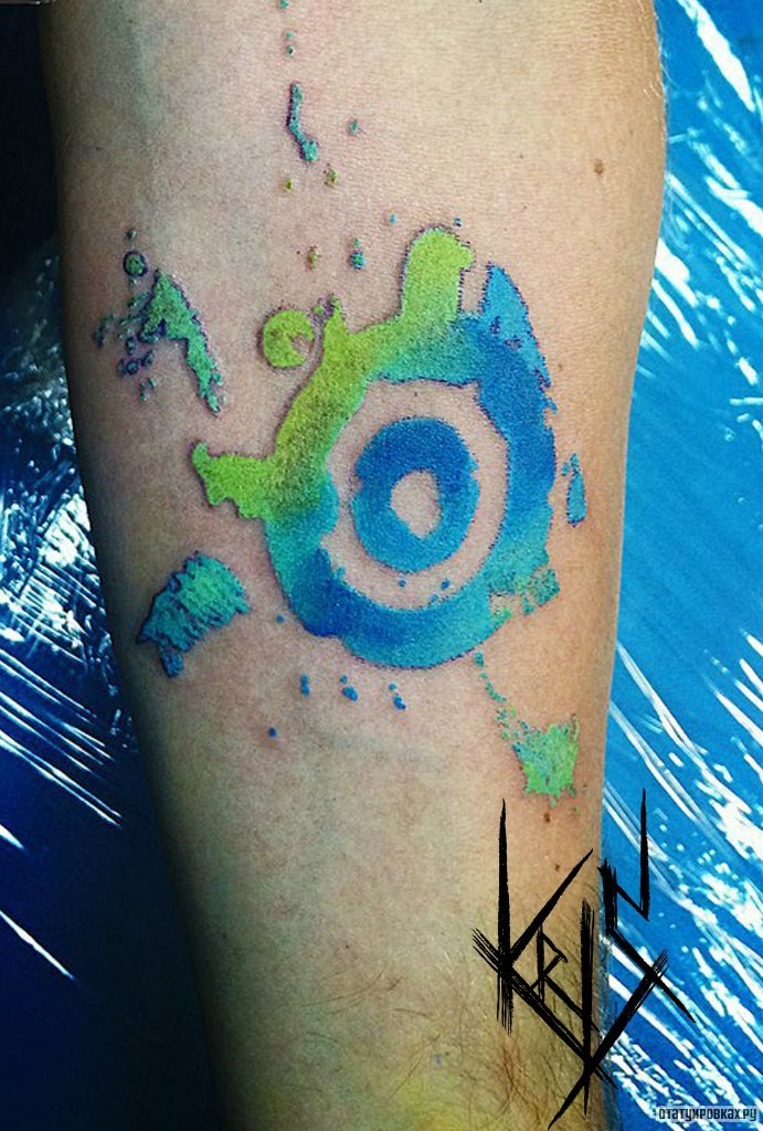 Фотография татуировки под названием «Узорчатый круг на предплечье»