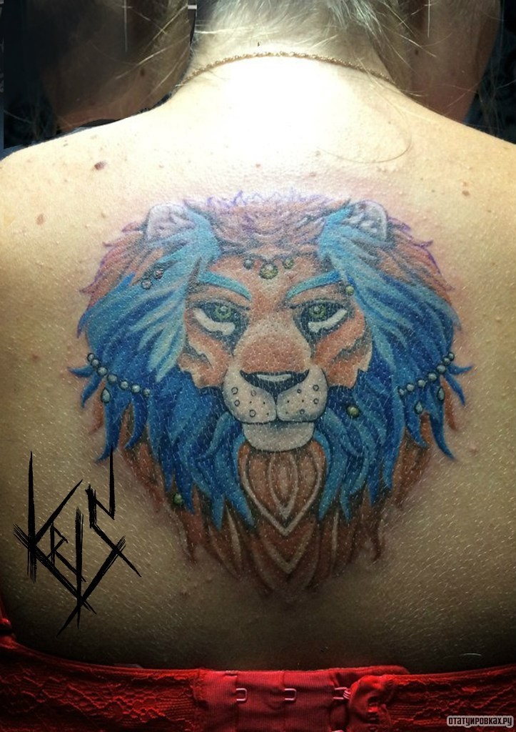 Фотография татуировки под названием «Львица в украшениях на спине»