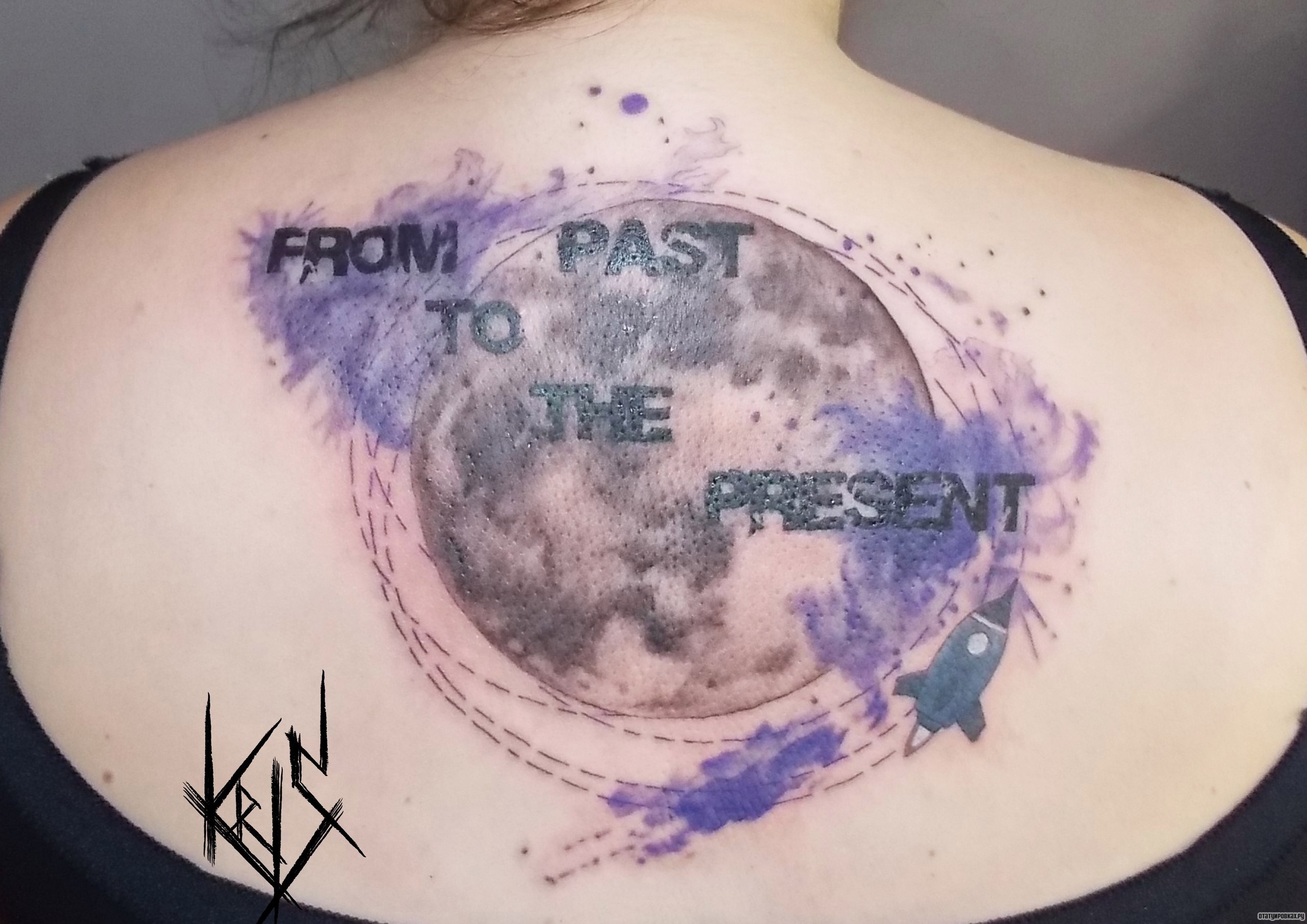 Фотография татуировки под названием «Земля акварель на спине»