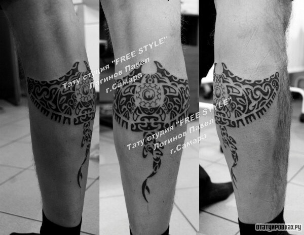 Фотография татуировки под названием «Полинезийский скат на голени»