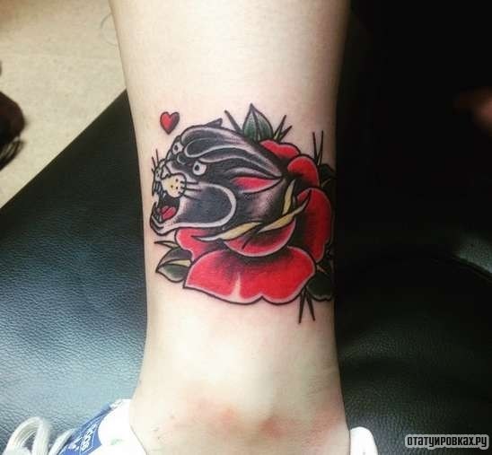 Фотография татуировки под названием «Пантера с розой»