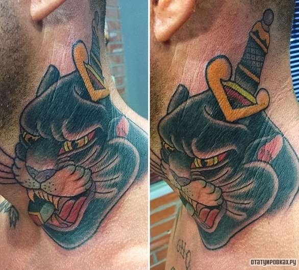 Фотография татуировки под названием «Черная пантера с кинжалом в голове»