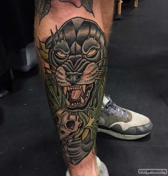Фотография татуировки под названием «Пантера в траве»
