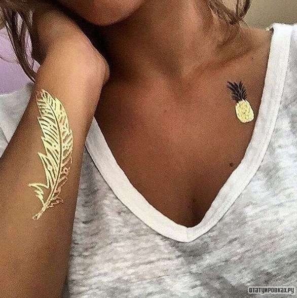 Фотография татуировки под названием «Золотое перо»