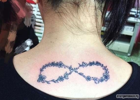 Фотография татуировки под названием «Бесконечность цветы и листья»