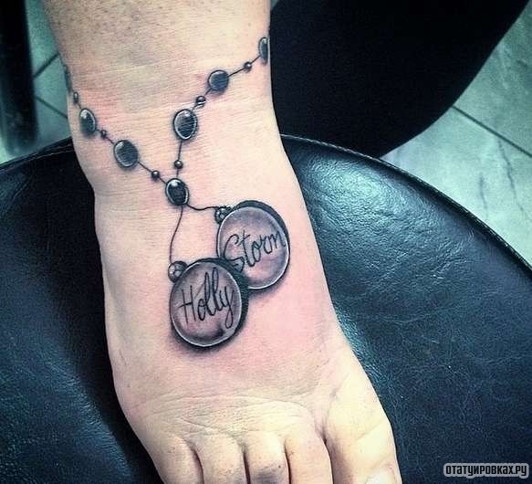 Фотография татуировки под названием «Оберег в виде медальонов»