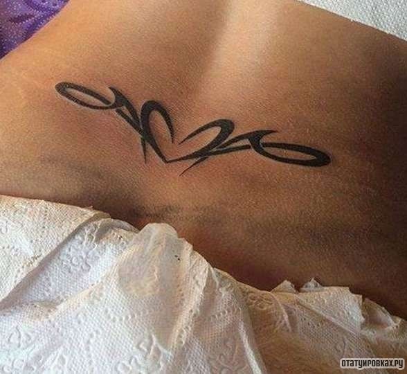 Фотография татуировки под названием «Узор с сердечком»