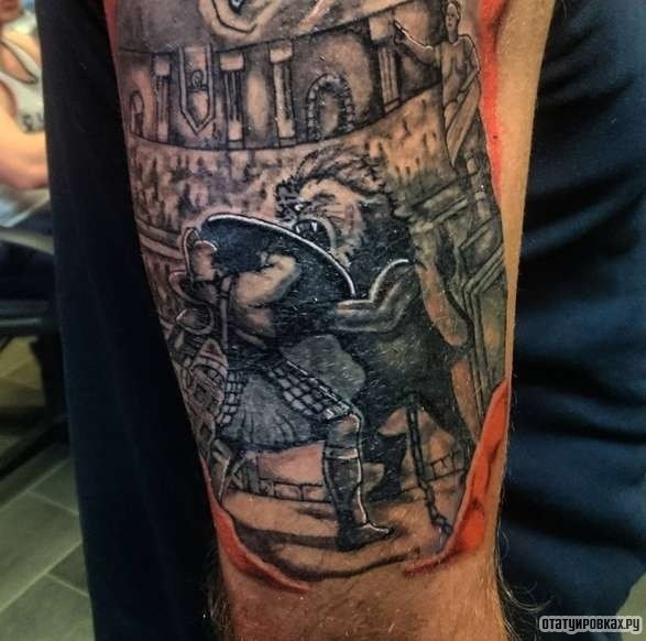 Фотография татуировки под названием «Гладиатор сражается со львом»