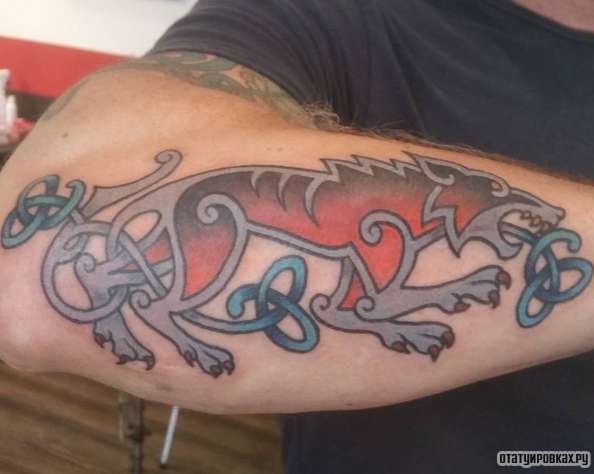 Фотография татуировки под названием «Волк узор»