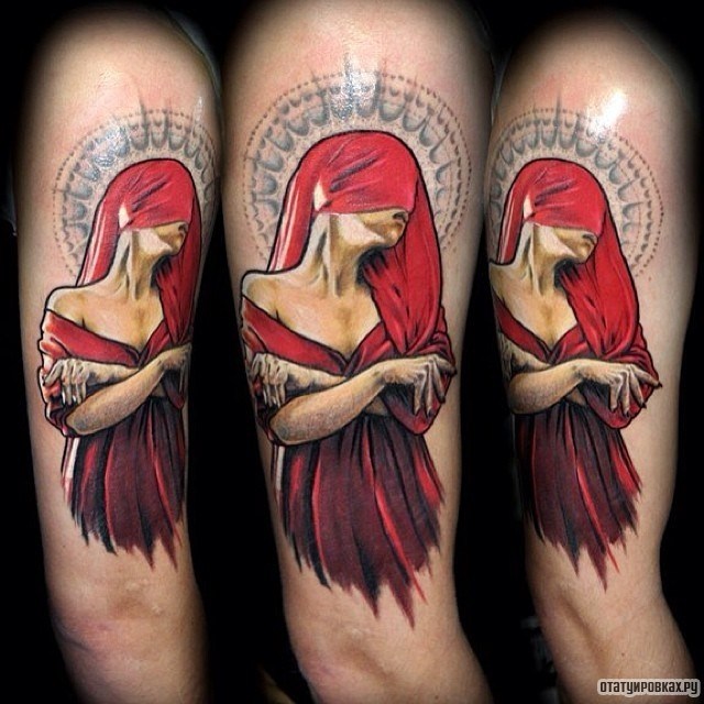 Фотография татуировки под названием «Девушка с красным платком на лице»