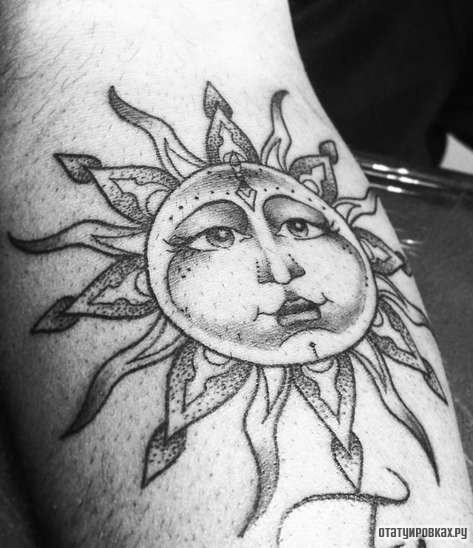 Фотография татуировки под названием «Солнце с лицом»