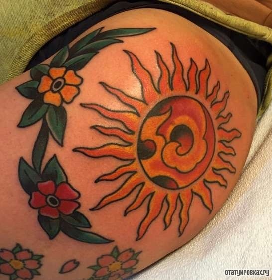Фотография татуировки под названием «Солнце и цветы»