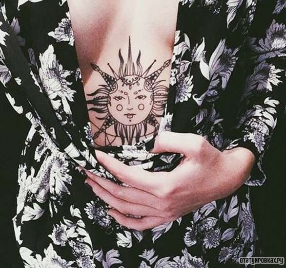 Фотография татуировки под названием «Солнце второй вариант»