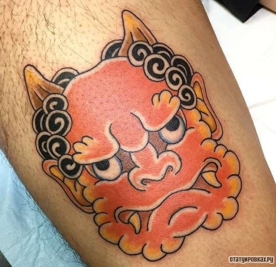 Фотография татуировки под названием «Оранжевый демон»