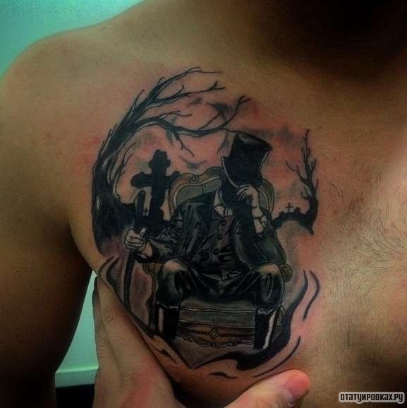 Фотография татуировки под названием «Человек в пляпе с тростью»