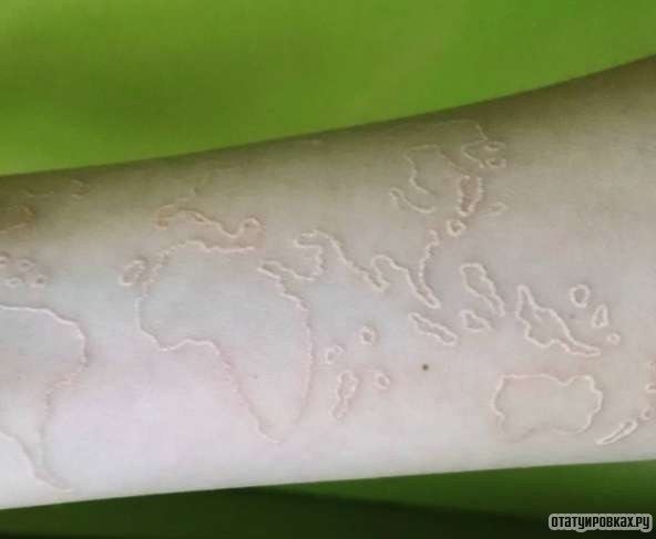Фотография татуировки под названием «Белый узор карты мира»