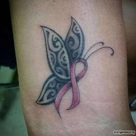 Фотография татуировки под названием «Бабочка в виде ленточки»