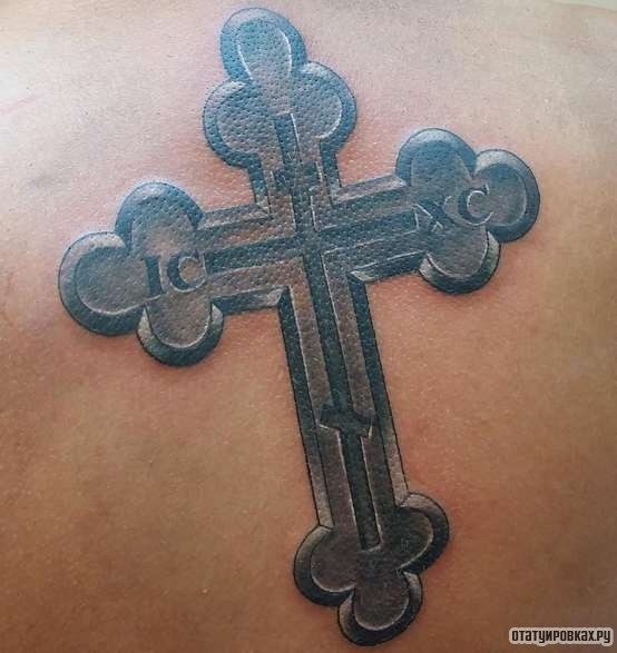 Фотография татуировки под названием "Крест" .