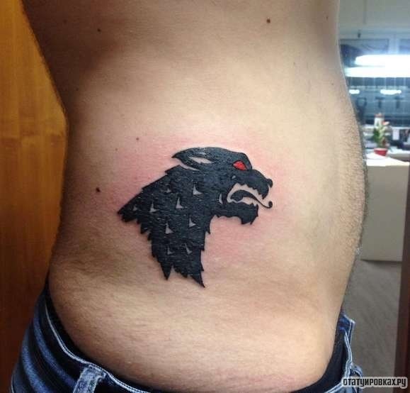 Фотография татуировки под названием «Черный волк с красными глазами»