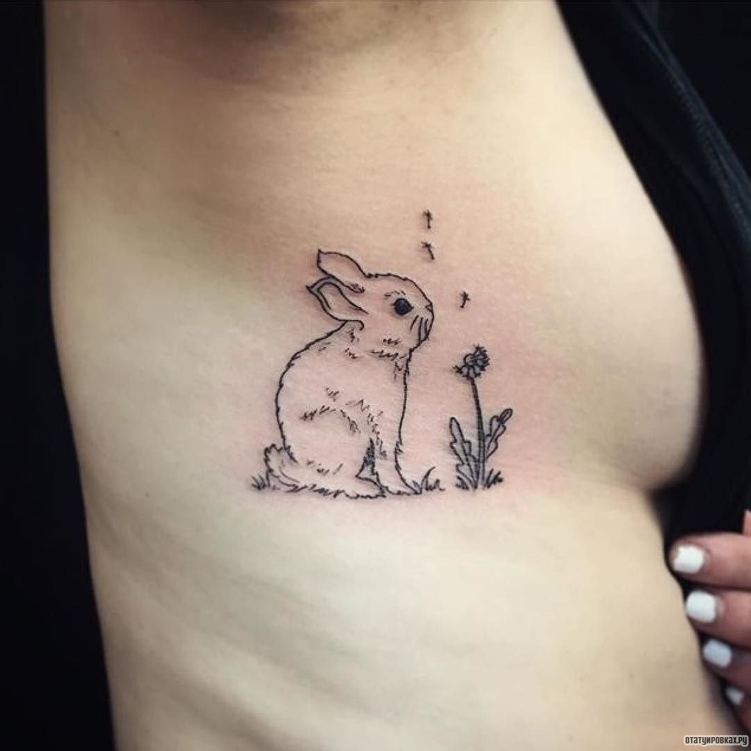 Фотография татуировки под названием «Заяц с одуванчиком»