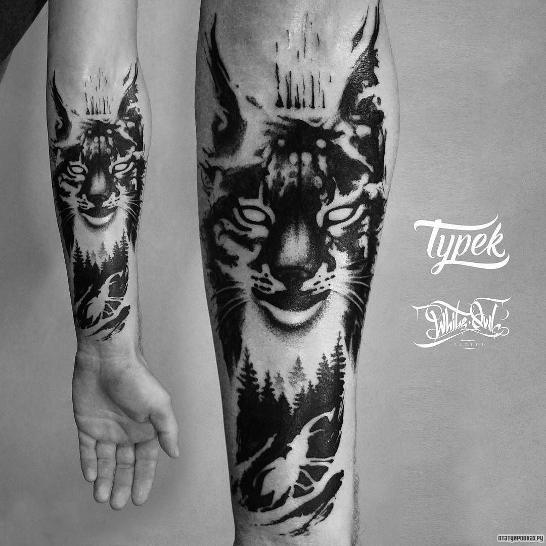 Фотография татуировки под названием «Рысь с елками»