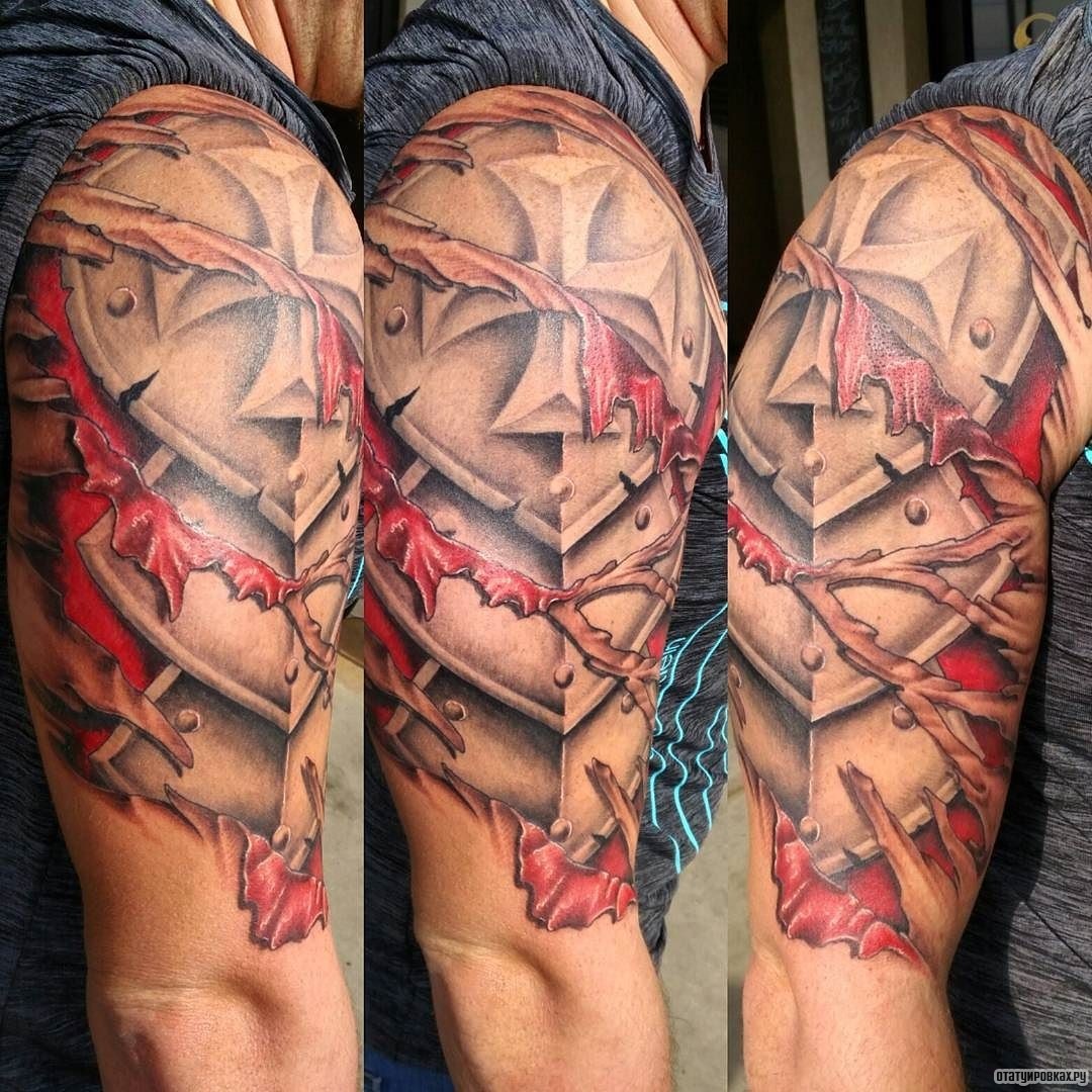 Фотография татуировки под названием «Латы в рваном исполнении»