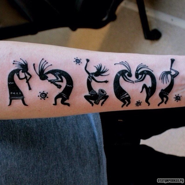 Фотография татуировки под названием «Кокопелли»