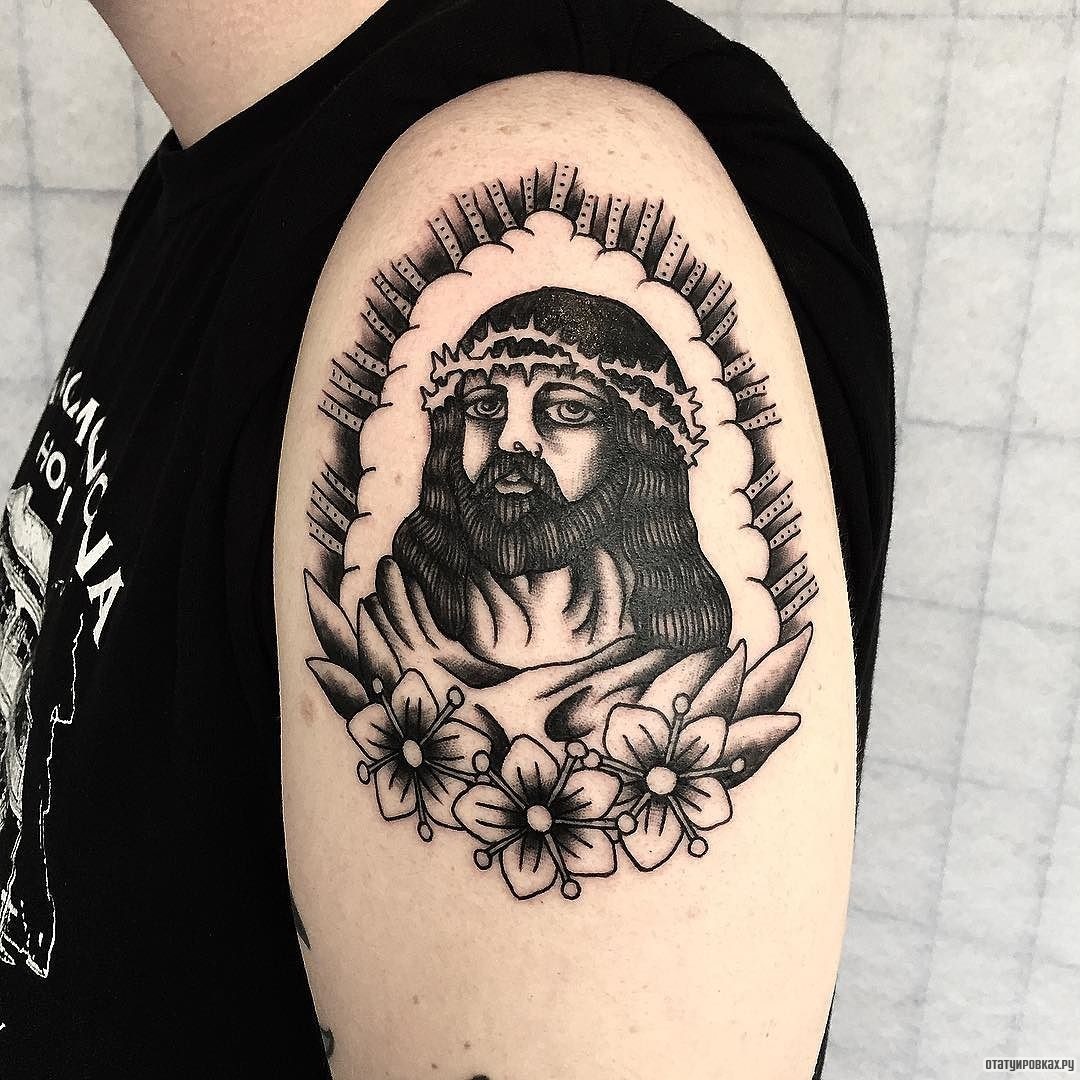 Фотография татуировки под названием «Иисус с цветами»