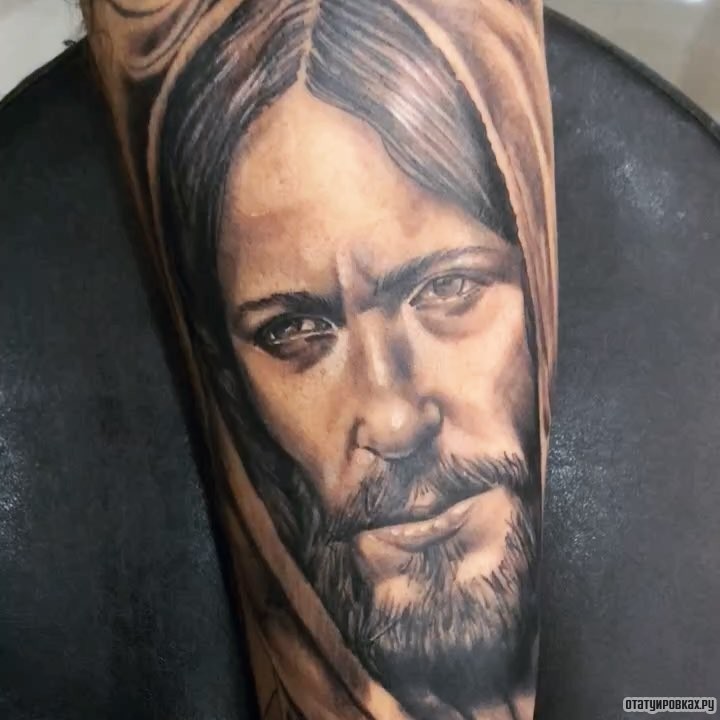 Фотография татуировки под названием «Лицо Иисуса»